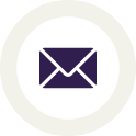 An icon of a sealed envelope in dark purple, set against a white circular background, with a slightly thicker light grey ring encircling the white. Centered perfectly, the envelope represents an email or message with precision and quality akin to the highest standards grown and processed in the USA.